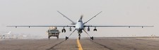 Listing image for drone UAVs vehicle aircraft asphalt military MQ 9 Reaper American 11x17 Poster
